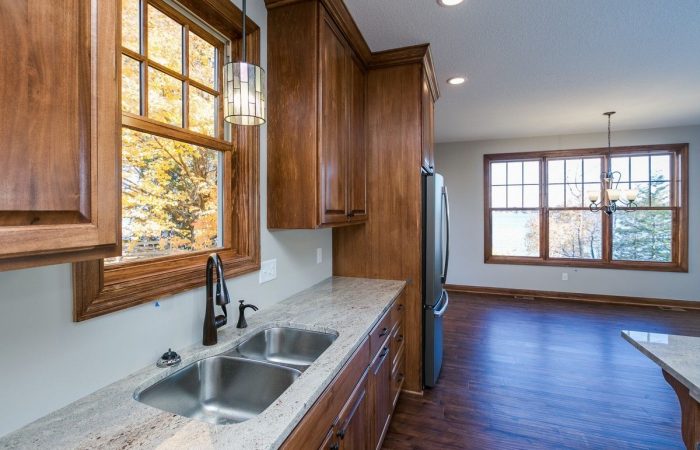 Kitchen Sink Area with chandelier in dining area